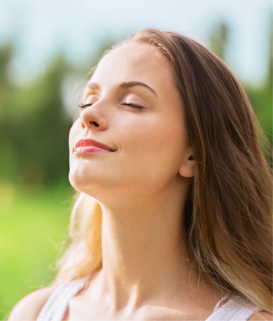 Woman taking in fresh air outside