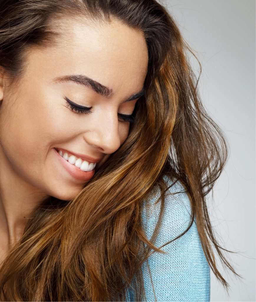 Bashful brunette woman