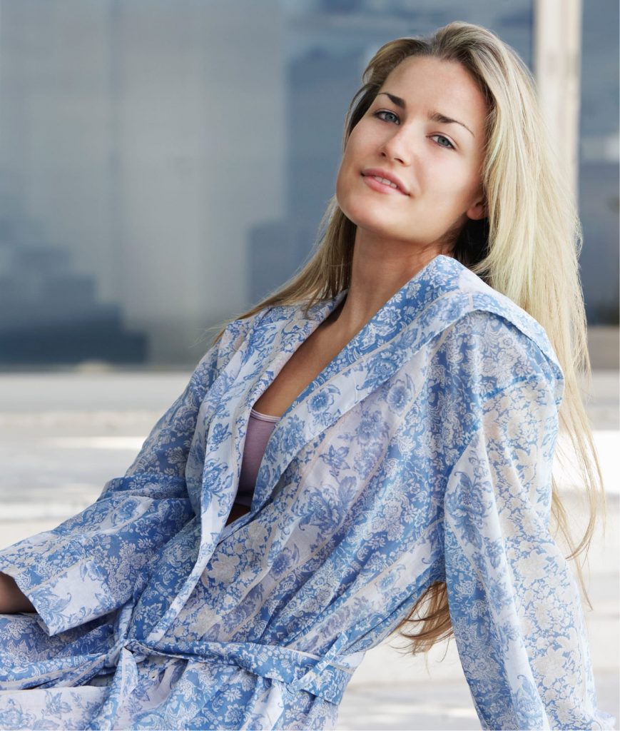 Blonde woman wearing a blue robe